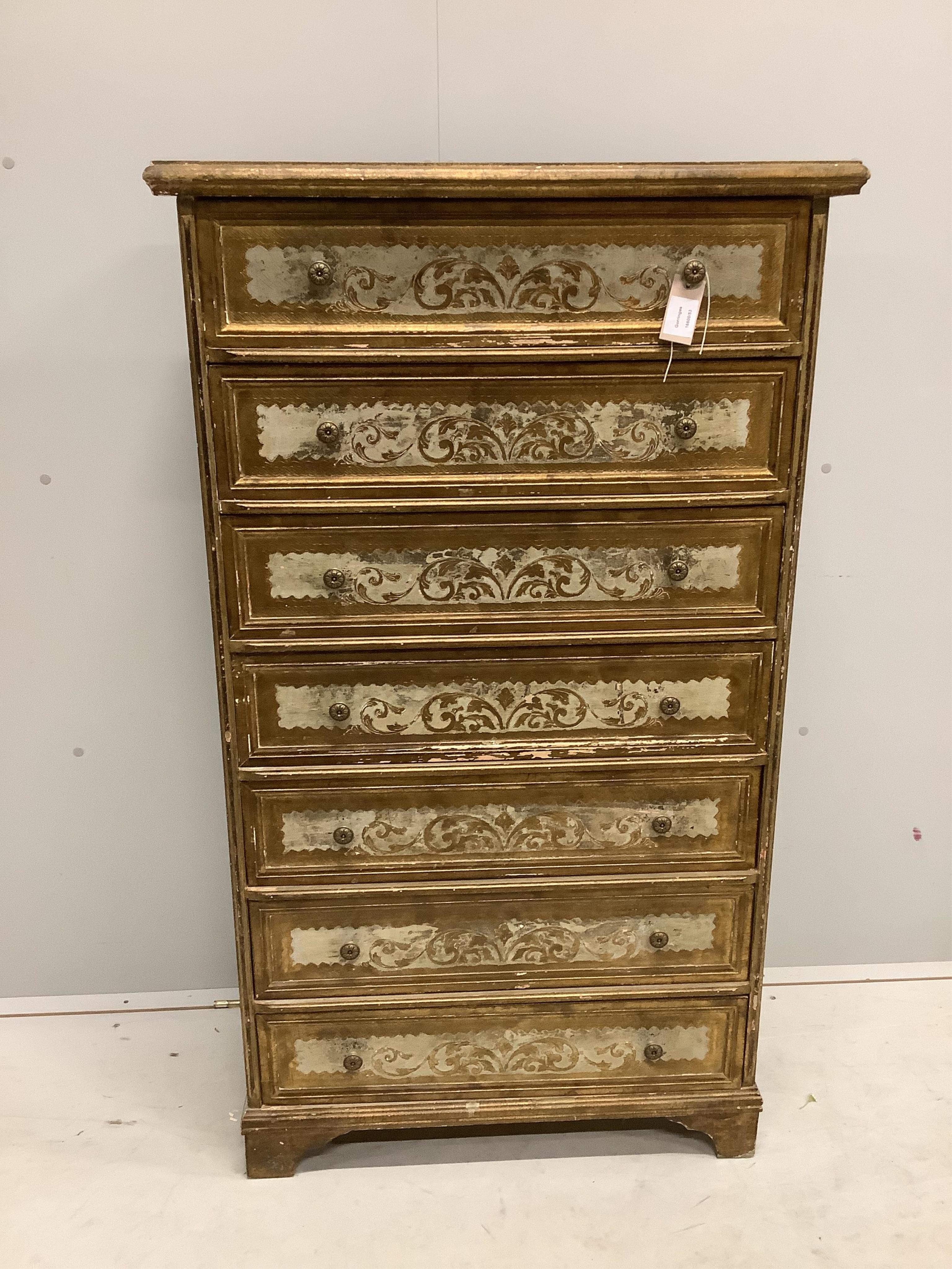 A Venetian style cream and gilt painted tall chest of seven drawers, width 74cm, depth 37cm, height 130cm. Condition - fair